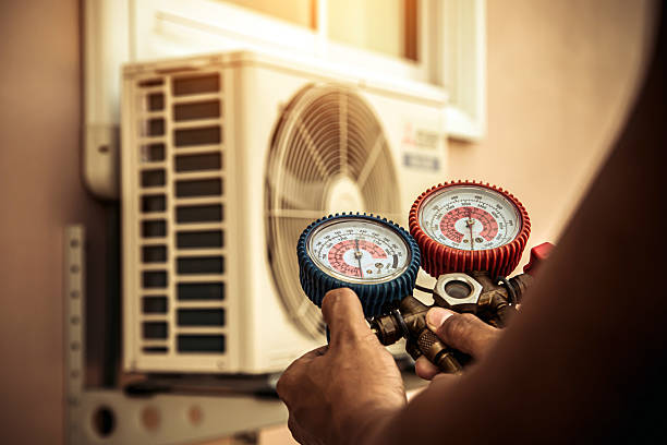Professional Heat Pump Repair technician working in Brave, PA